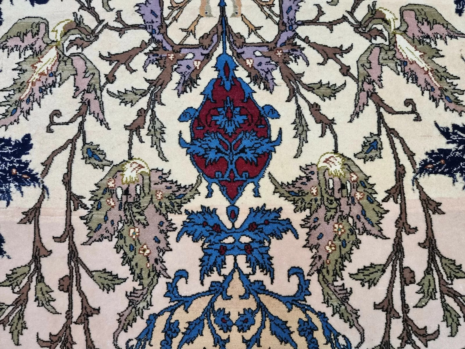 Texture shot highlighting the radiant sheen of the silk pile.


