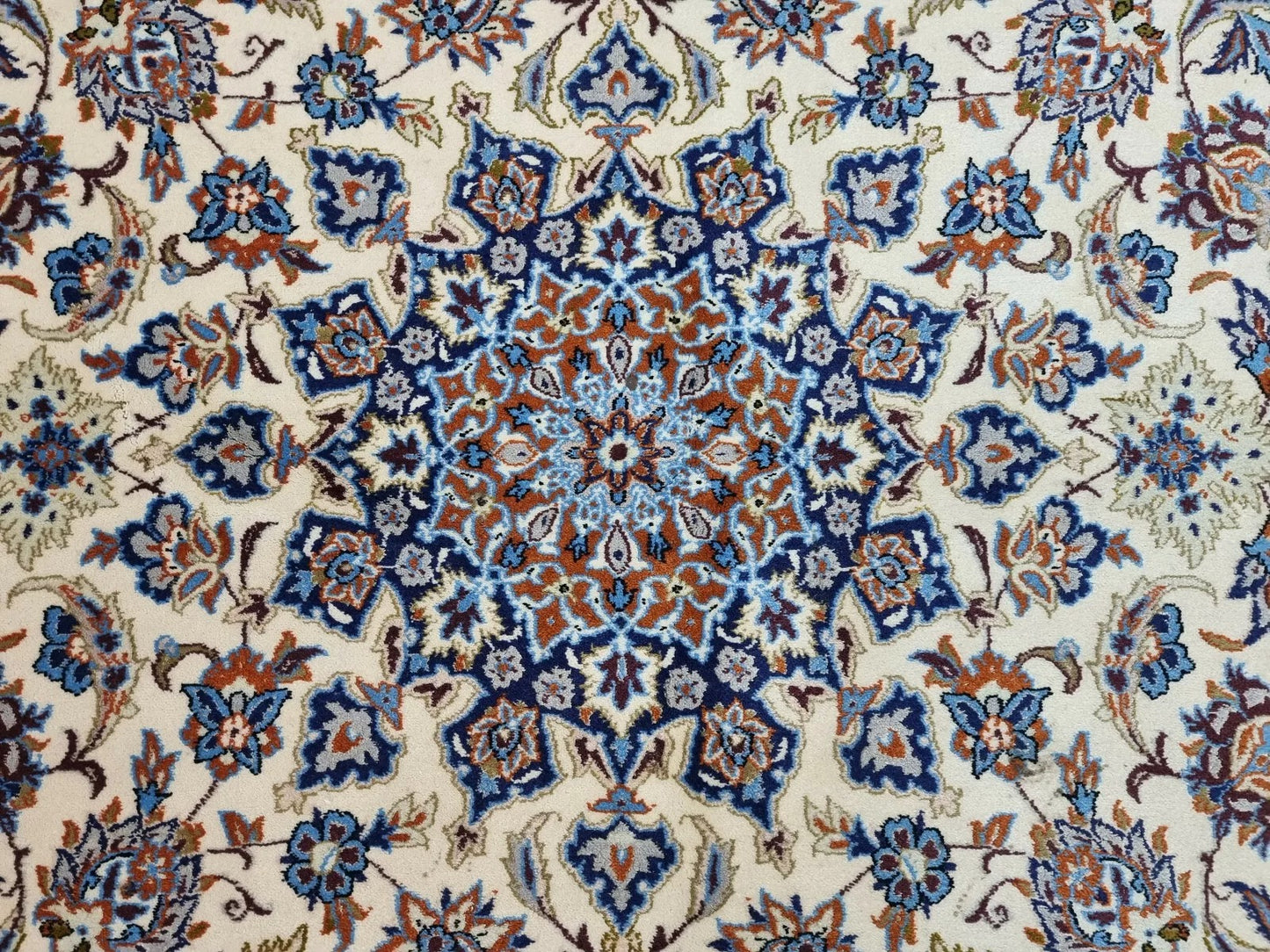 Elegant vintage Isfahan area rug made from high-quality kork wool on silk, showcasing traditional Persian artistry with a sophisticated beige color scheme.

