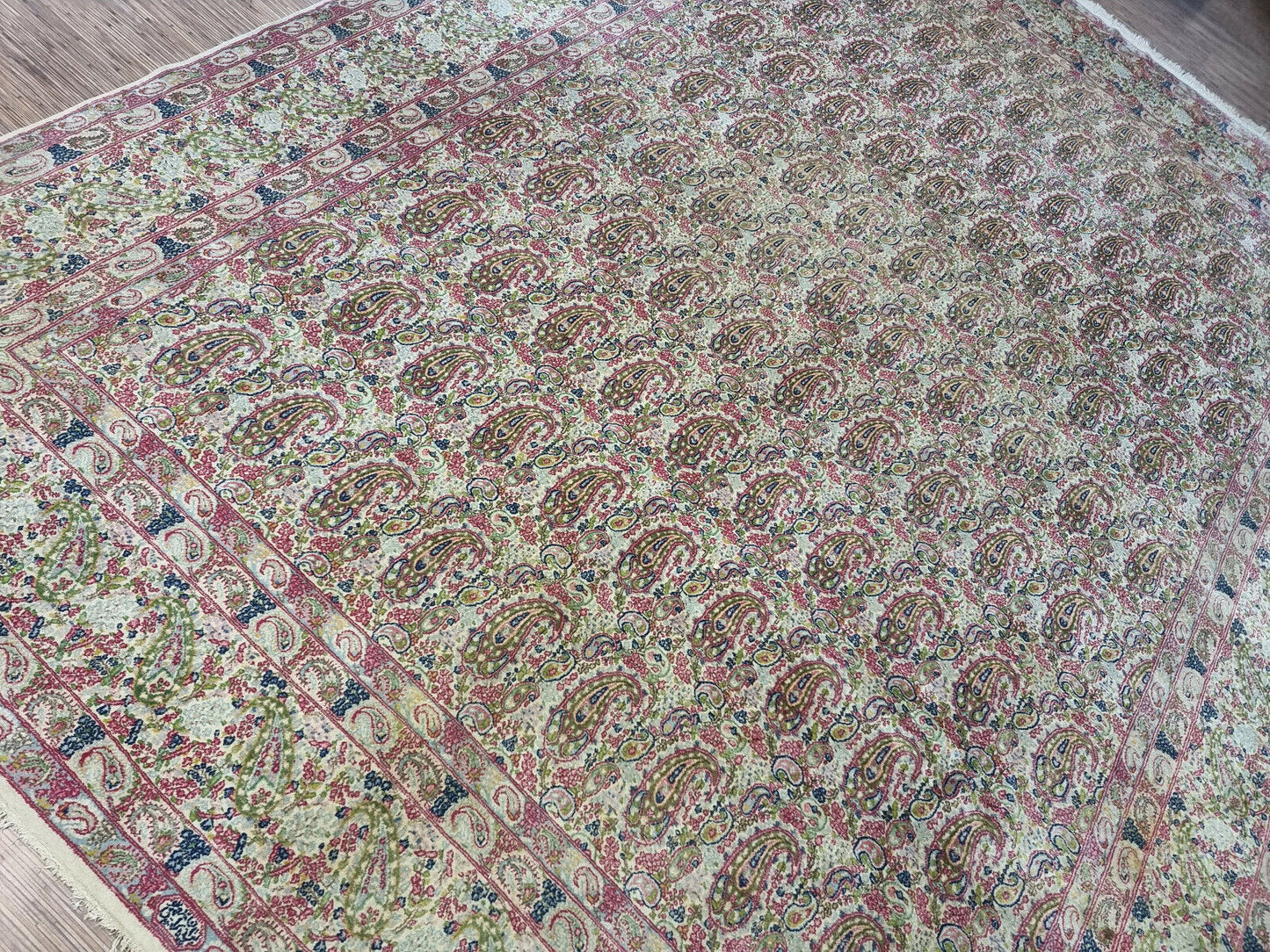 Large antique Persian Kerman rug measuring approximately 10 x 13 feet, hand-knotted on a cotton foundation, suitable for a grand living room or dining room.

