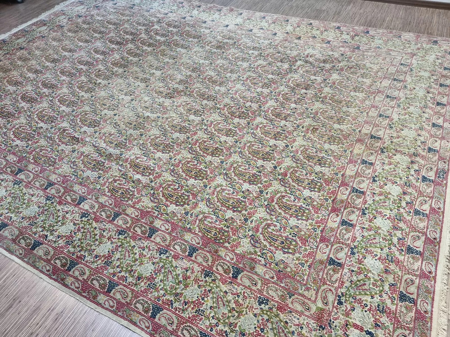 Large antique Persian rug from Kerman, hand-knotted in the 1930s, featuring intricate motifs typical of Kerman craftsmanship and a versatile beige color scheme.

