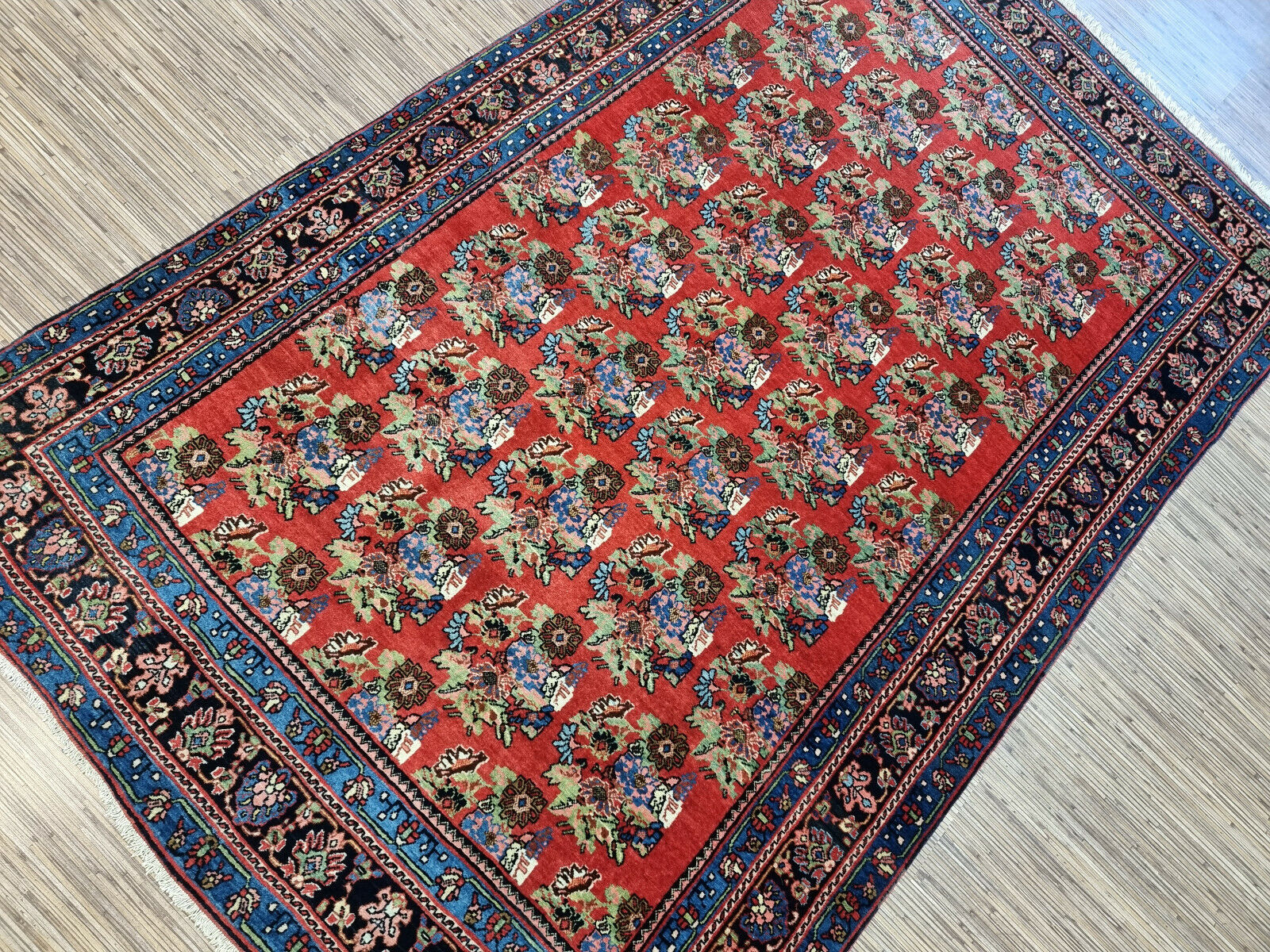 Antique Persian Bidjar rug measuring 4.3 x 6.9 feet, hand-knotted in the early 1900s, professionally cleaned and in excellent condition for its age.

