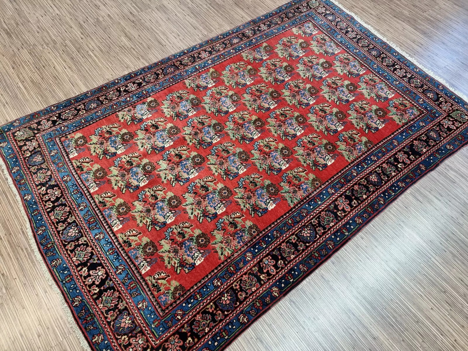 Close-up of the wool pile and dense hand-knotted weave on an early 1900s Persian Bidjar rug, highlighting the renowned durability that gives Bidjar rugs their "Iron Rug" reputation.

