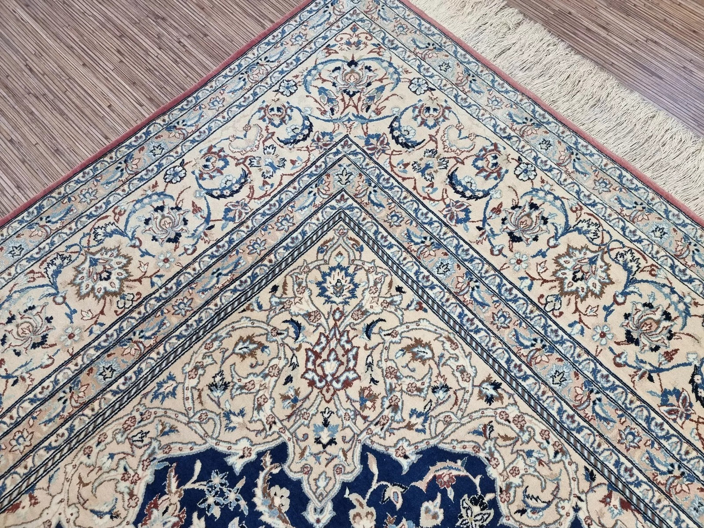 Large antique Persian Nain carpet from the 1920s, measuring approximately 215 × 350 cm, with a harmonious ivory, navy, and blue palette suitable for living rooms or dining areas.

