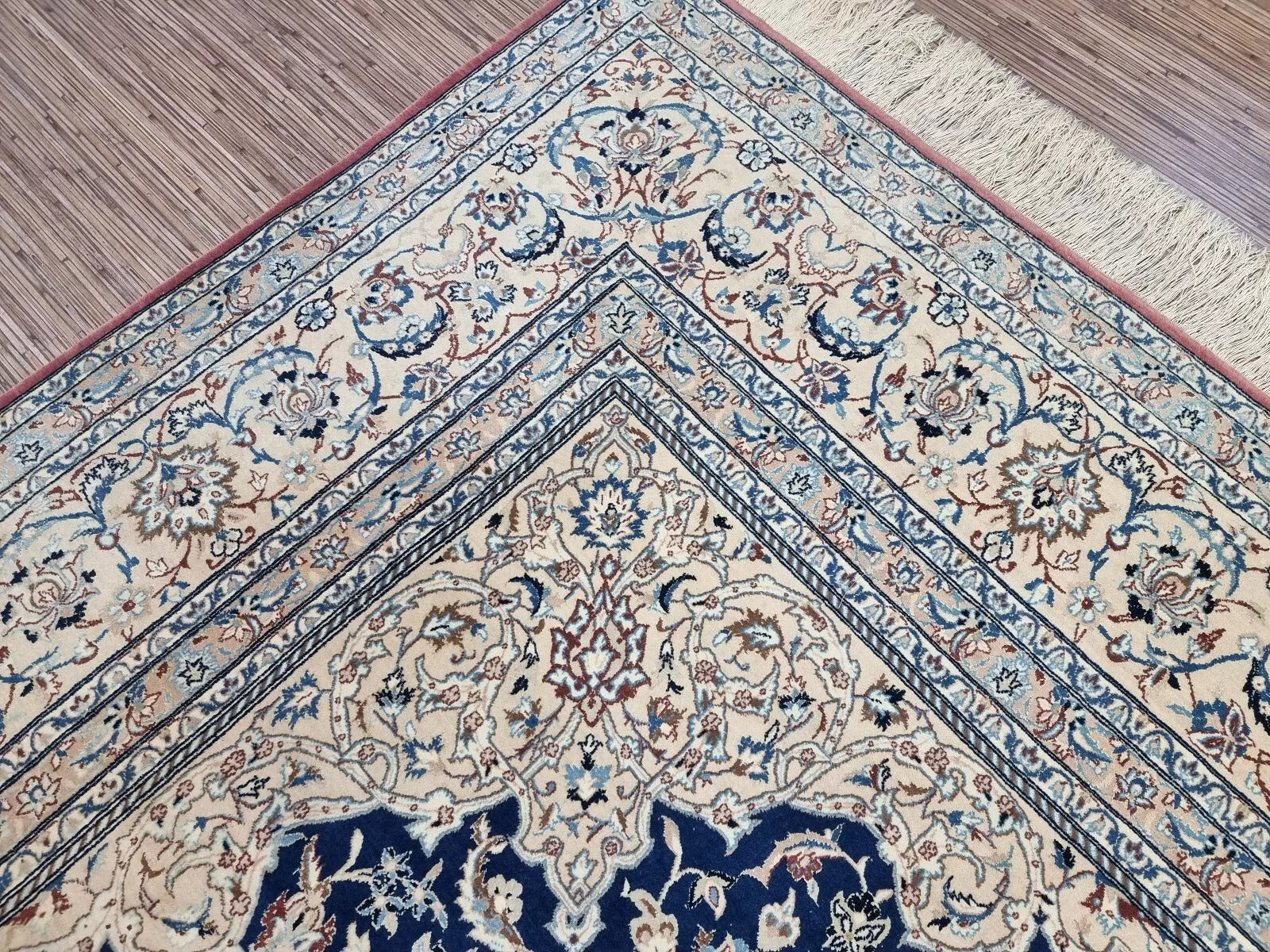 Large antique Persian Nain carpet from the 1920s, measuring approximately 215 × 350 cm, with a harmonious ivory, navy, and blue palette suitable for living rooms or dining areas.

