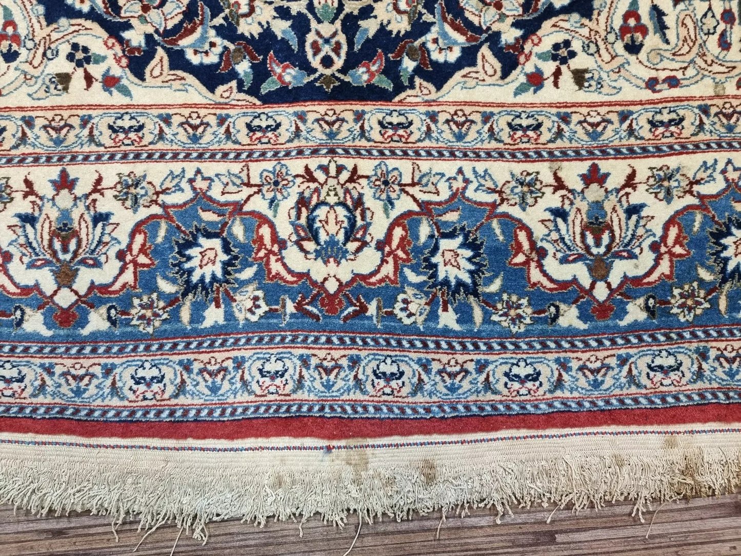 Antique Persian rug from Nain, hand-knotted in the 1920s, featuring kork wool pile on a cotton foundation with approximately 800,000 knots per square meter for exceptional detail and durability.

