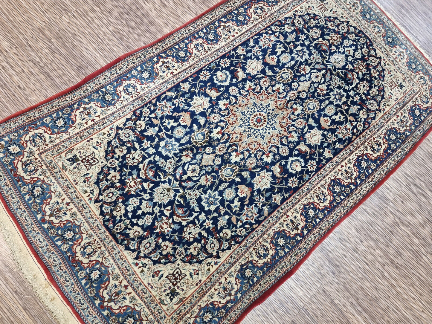 Antique Persian Nain runner measuring 3.4 × 6.1 feet, hand-knotted circa 1920s in excellent condition for its age, professionally cleaned and ready for immediate use or display.

