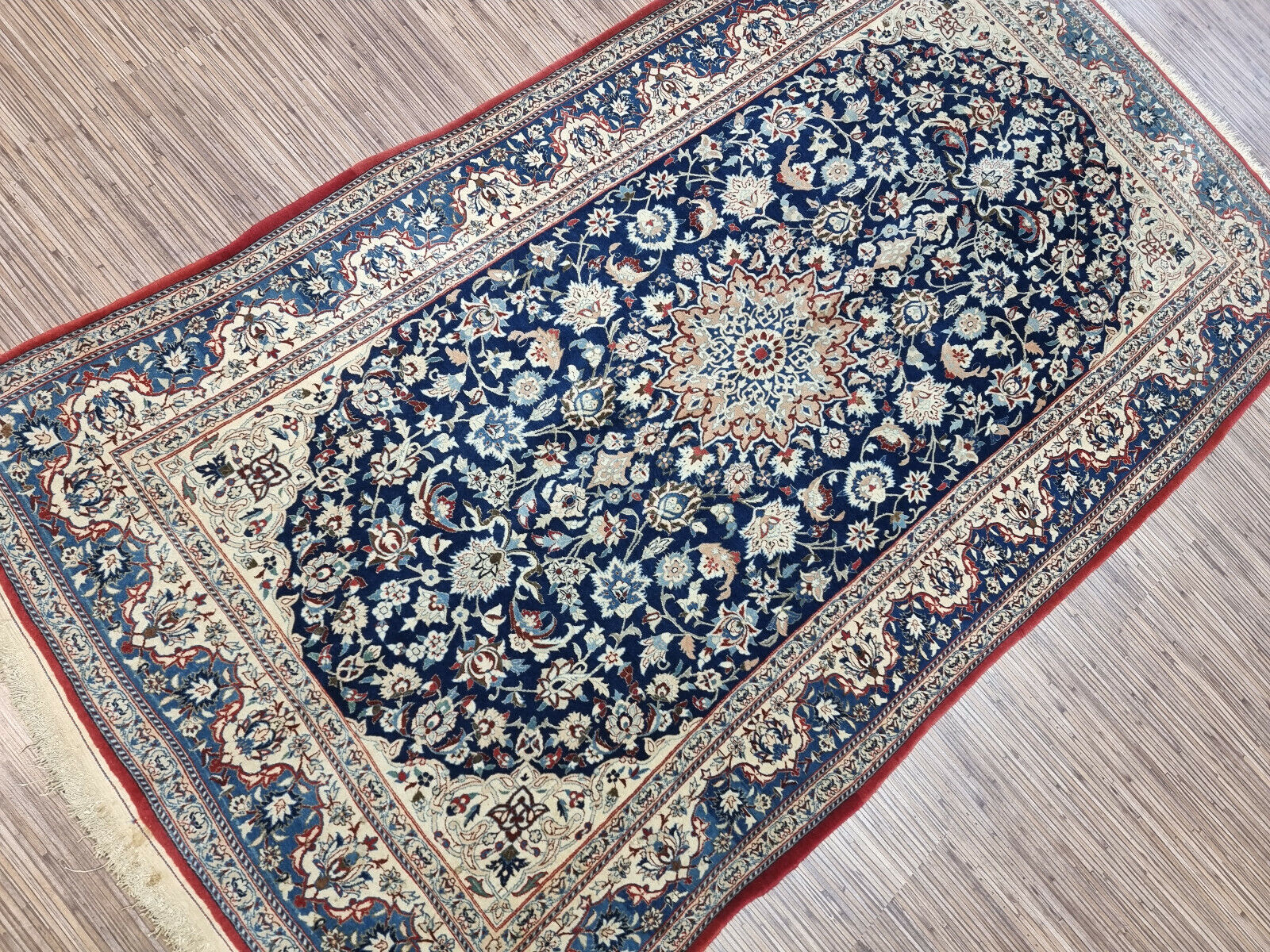 Antique Persian Nain runner measuring 3.4 × 6.1 feet, hand-knotted circa 1920s in excellent condition for its age, professionally cleaned and ready for immediate use or display.

