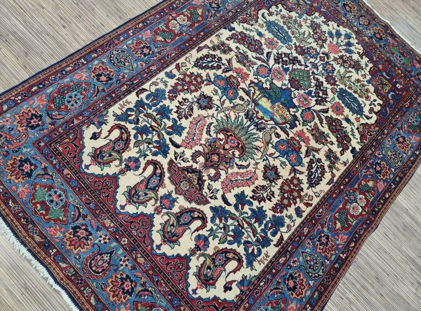 Antique Persian Kashan rug measuring 4.5 × 6.4 feet, hand-knotted circa 1920s in excellent condition for its age, professionally cleaned and ready for immediate use.

