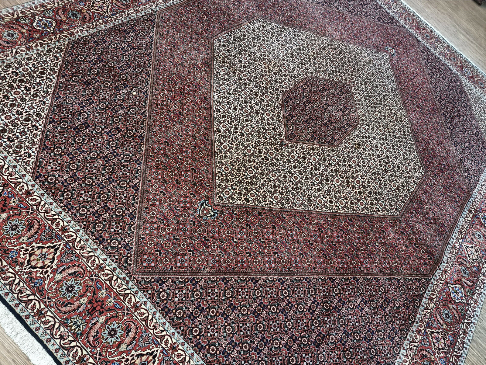 Vintage Persian Bidjar rug measuring 9.8 × 12.9 feet, hand-knotted circa 1970s in excellent vintage condition, professionally cleaned and ready for immediate use as a statement piece in large living spaces or dining areas.

