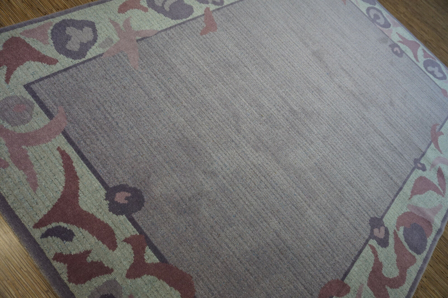 Close-up detail of intricate geometric patterns on the Vintage Dutch Rug
