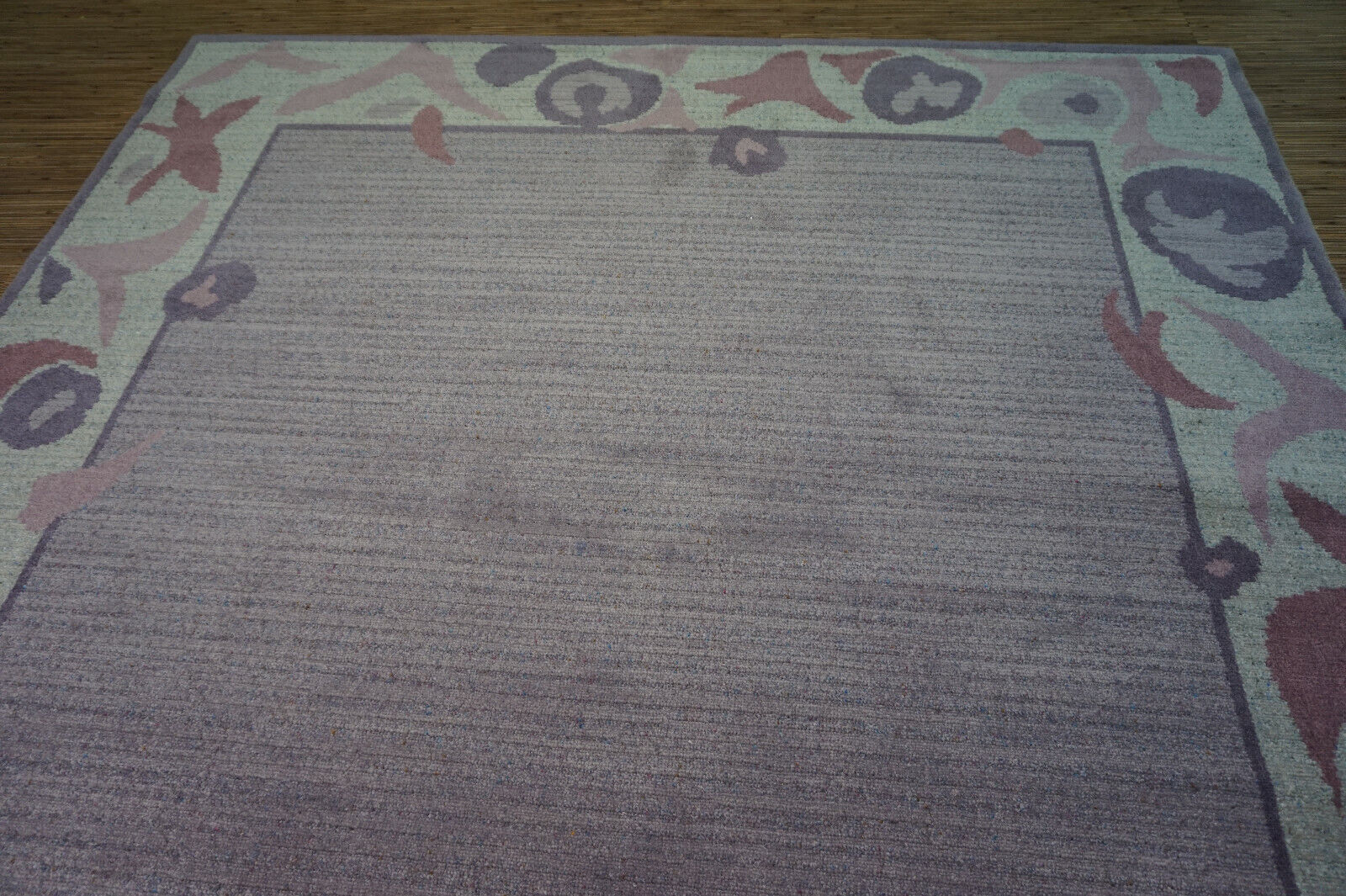 Darker shades of purple accent on the Vintage Dutch Rug