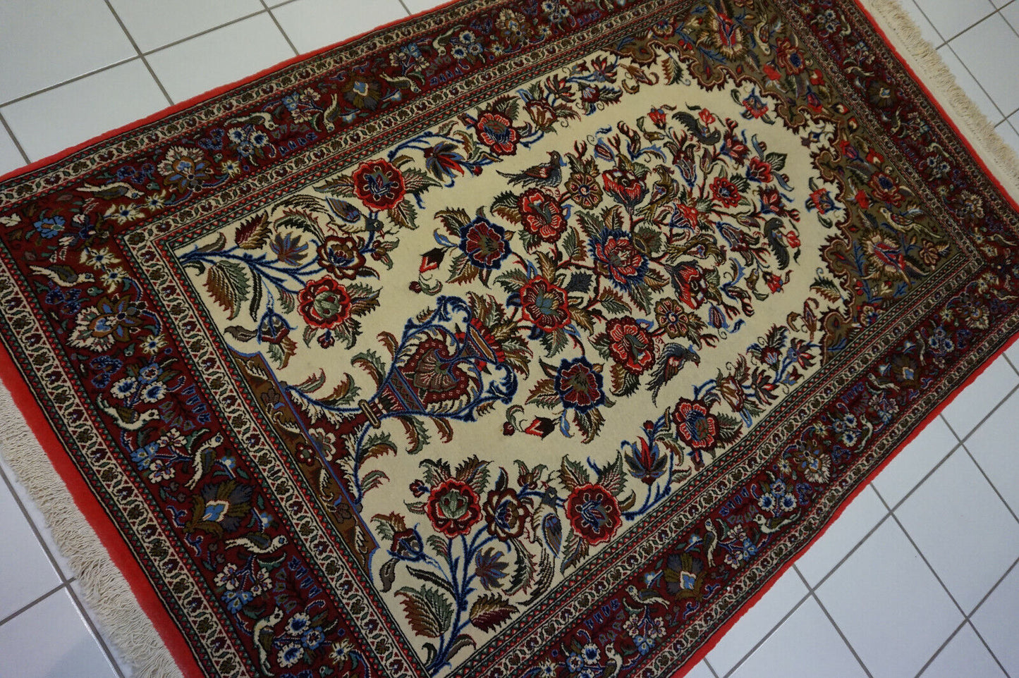 Close-up detail of central oval pattern on the Persian Prayer Rug