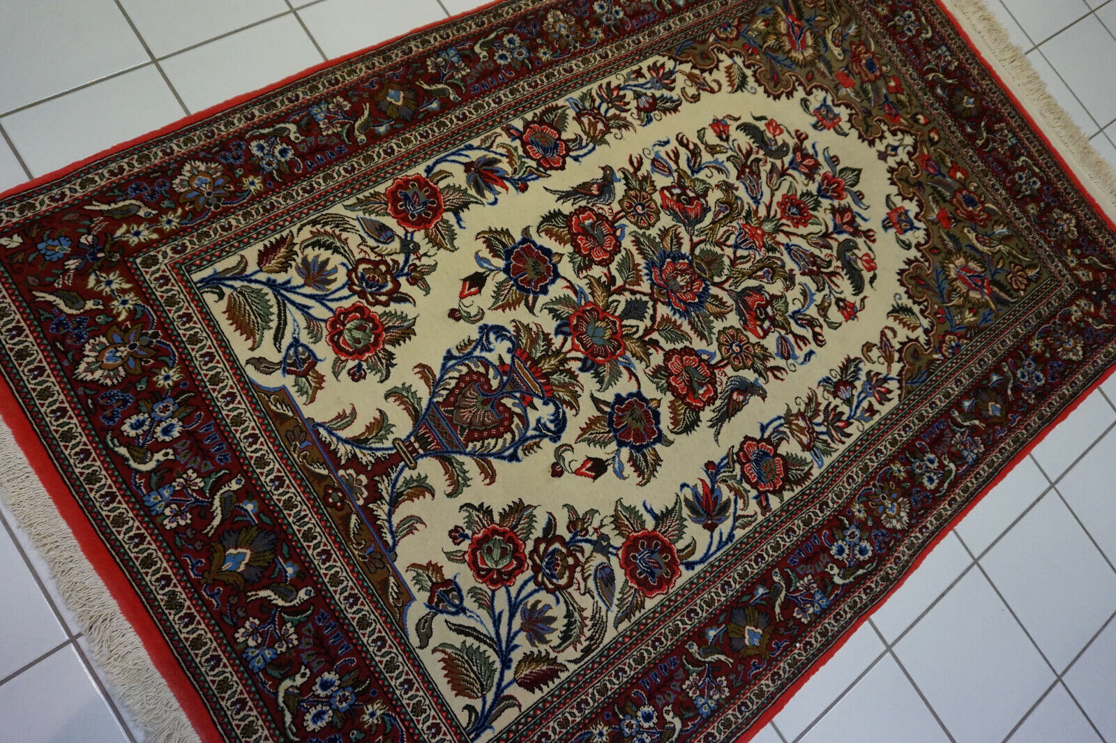 Close-up detail of central oval pattern on the Persian Prayer Rug