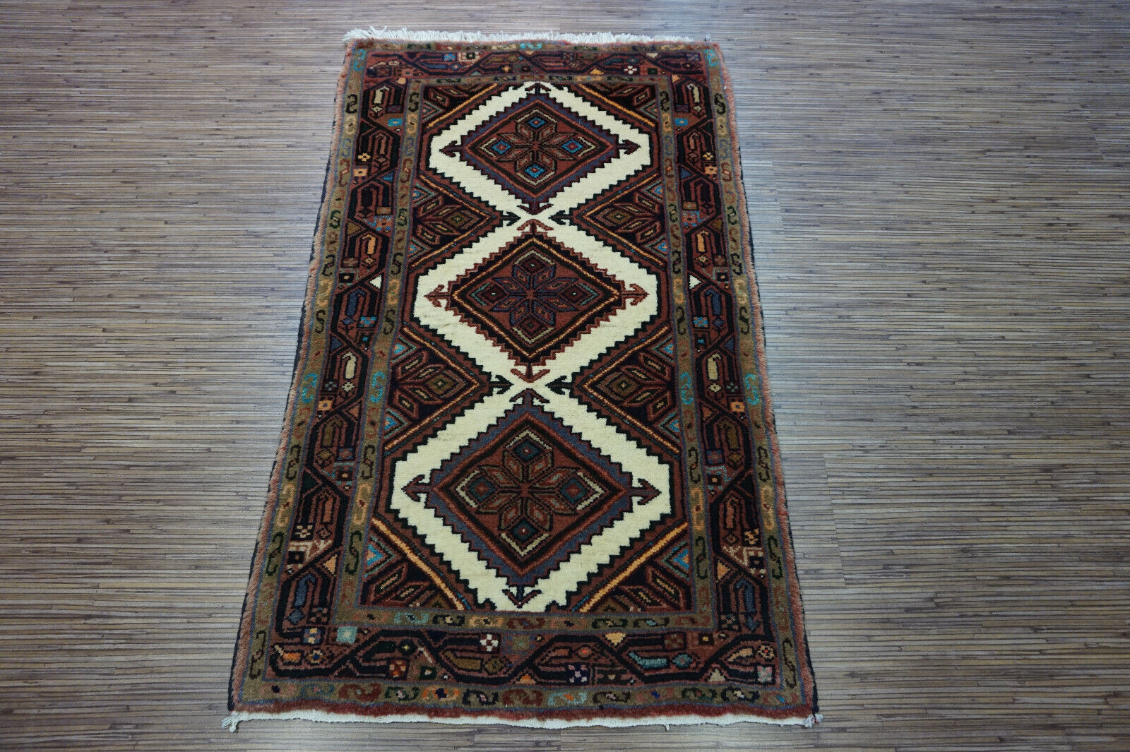 Craftsmanship showcased in the soft and durable wool material of the Persian Style Rug