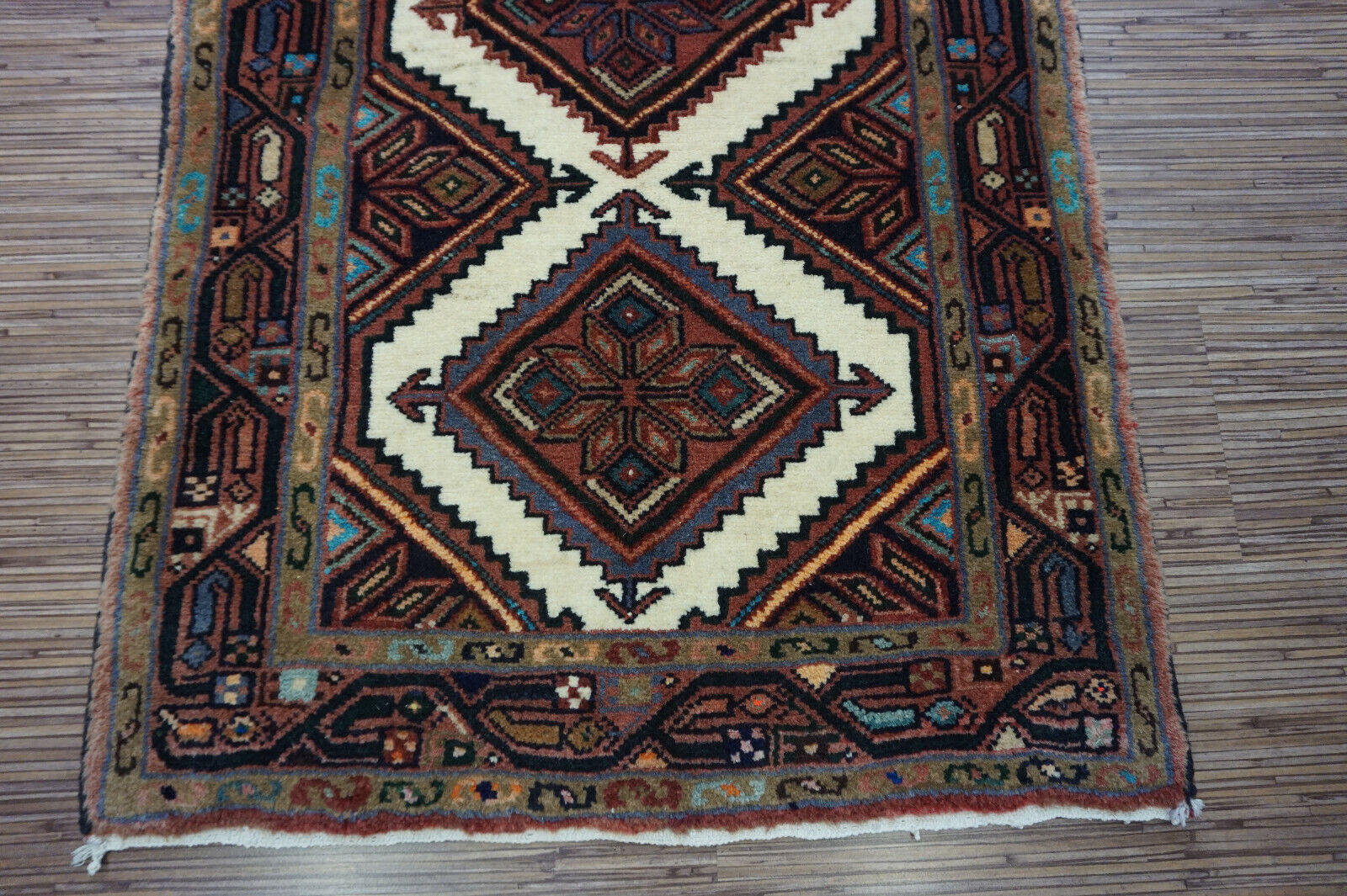 Ideal for small spaces showcased in a room setting with the Persian Style Hamadan Rug