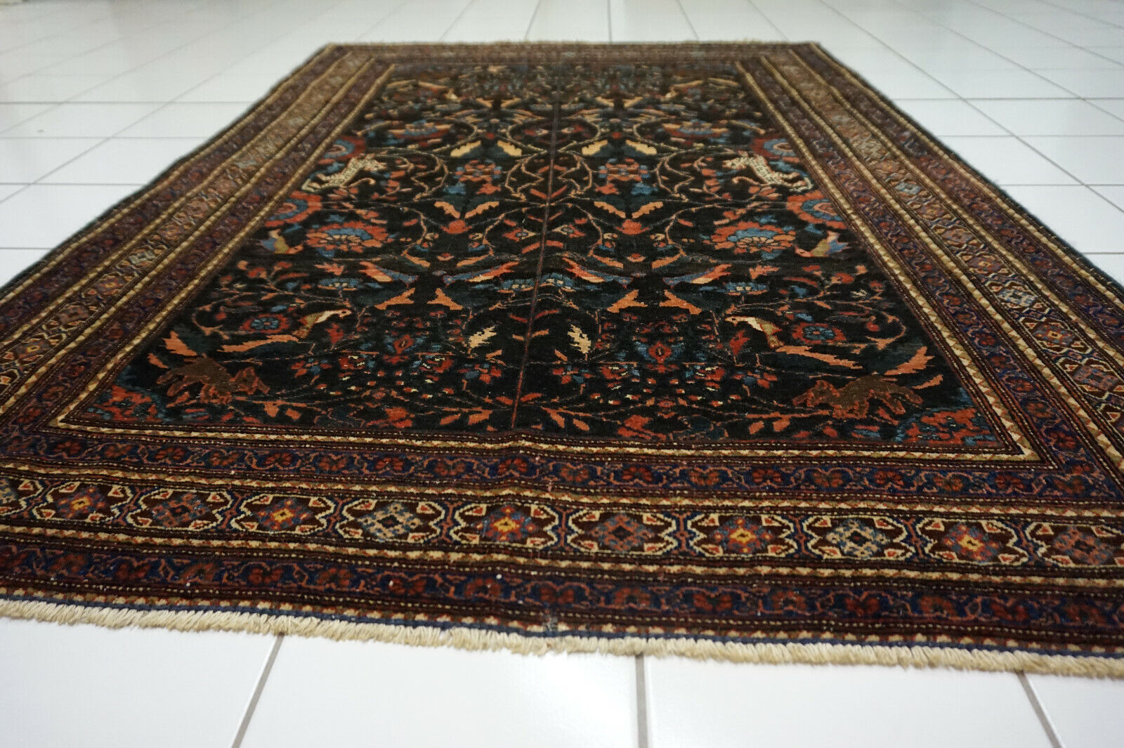  Artistic display of the Handmade Antique Persian Tehran Rug as a focal point in the room