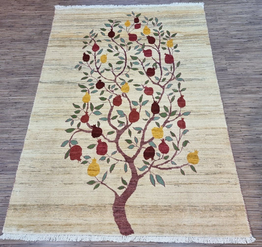 Vintage Wool Gabbeh Rug (1970s) - A captivating tree of plenty design in warm, earthy tones. (4.7' x 6.4')