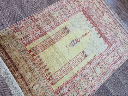 Antique Silk Tabriz Prayer Rug (1880s): Close-up view of the luxurious handwoven silk with a soft cream background.