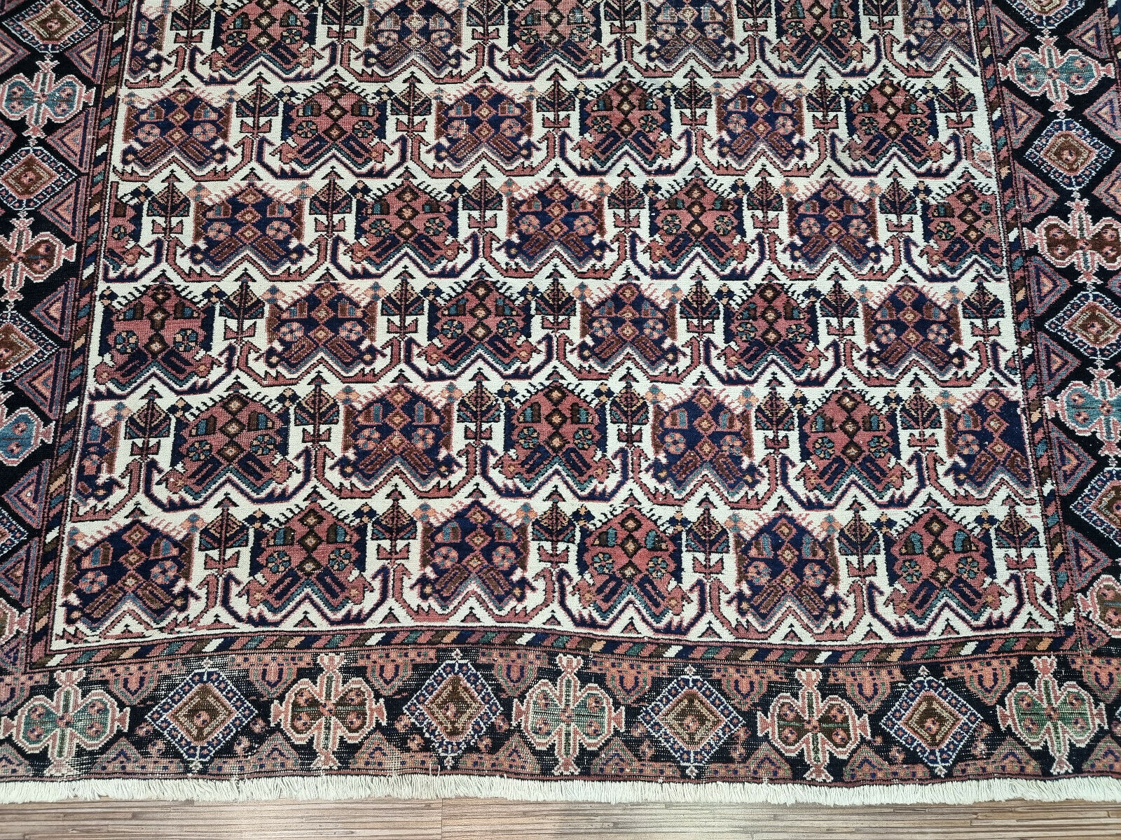 Deep blue Afshar rug: A captivating centerpiece for your living room (wool, 1920s).