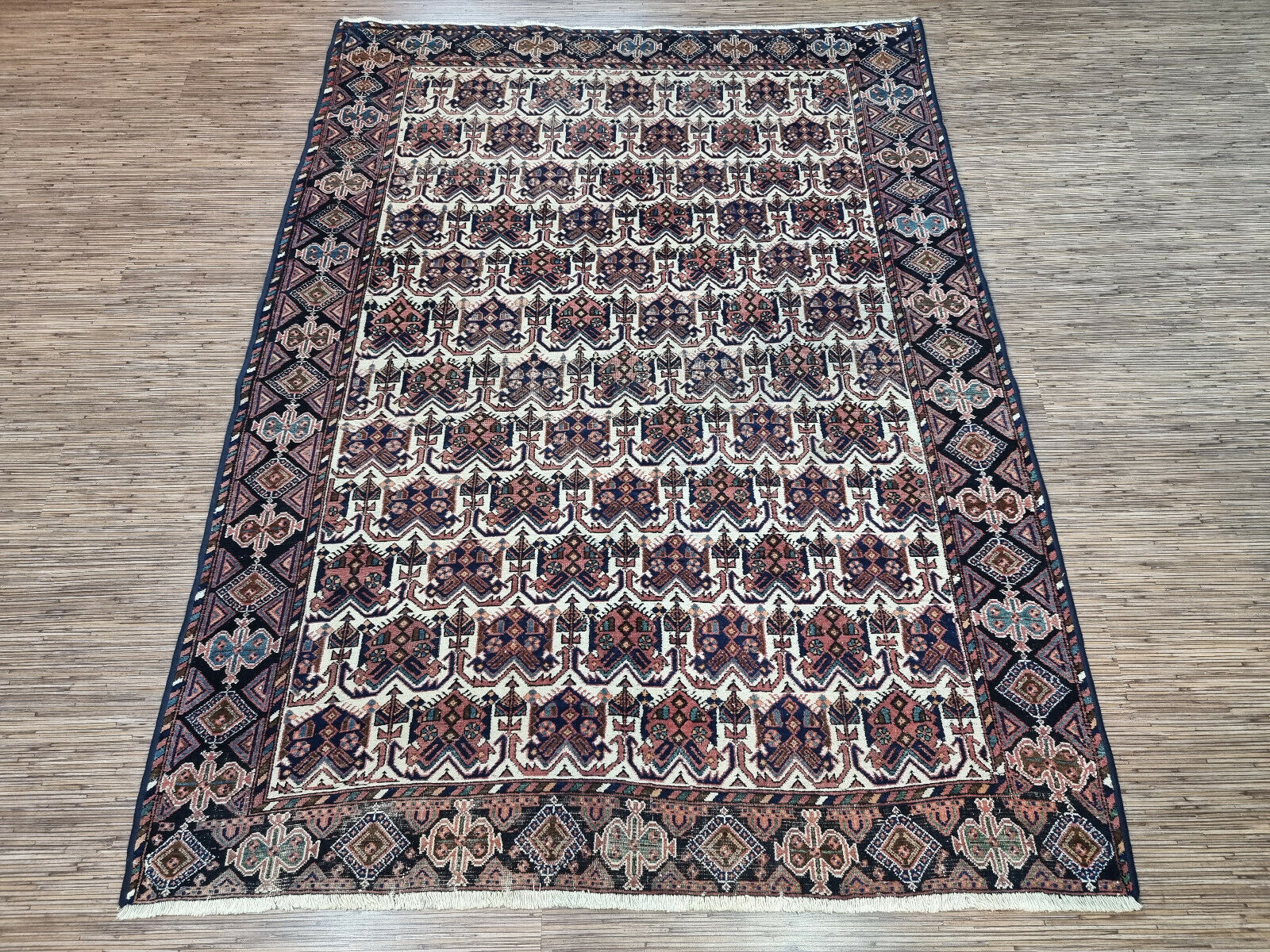 Vintage charm meets modern style: Handmade wool Afshar rug with captivating design.