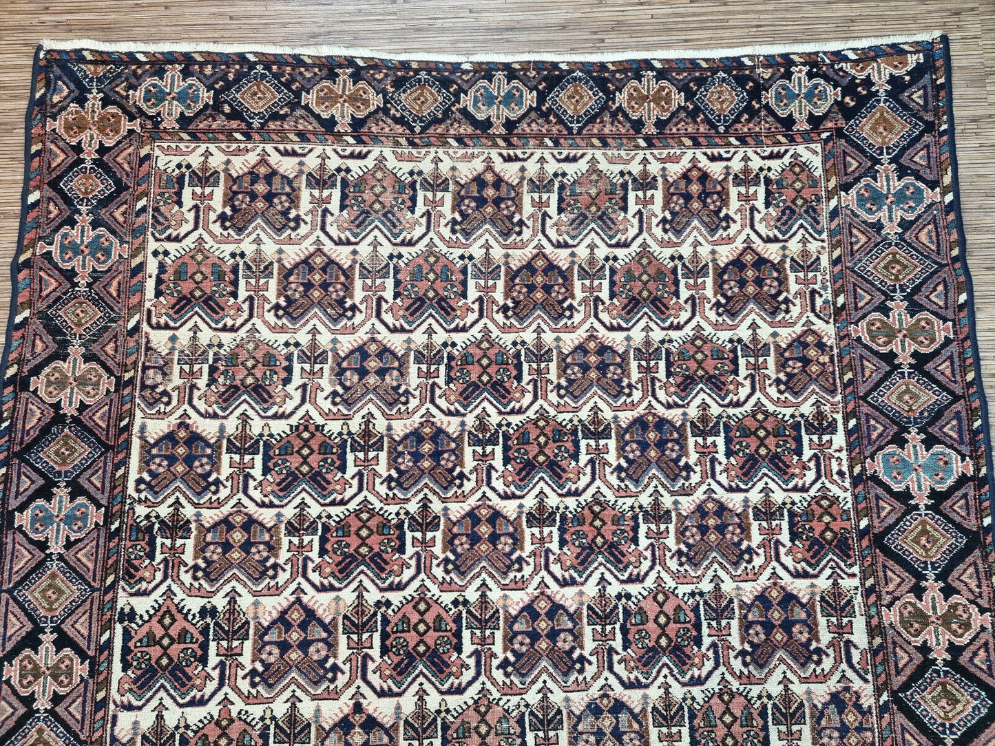 Well-preserved Afshar rug (1920s) adds warmth and character to any living space.