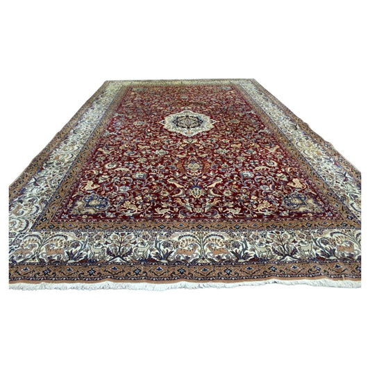 Close-up of intricate floral and animal motifs on a Persian Nain rug

