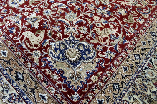 Persian collector’s rug with warm beige and sky blue hues

