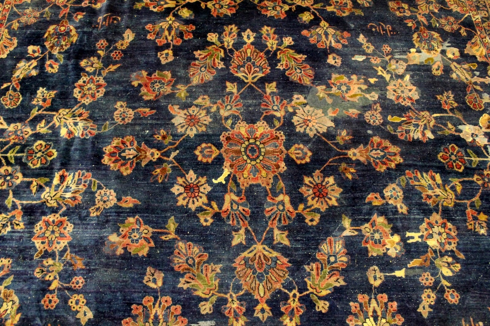 Hand-knotted Persian rug with elegant patterns and traditional designs

