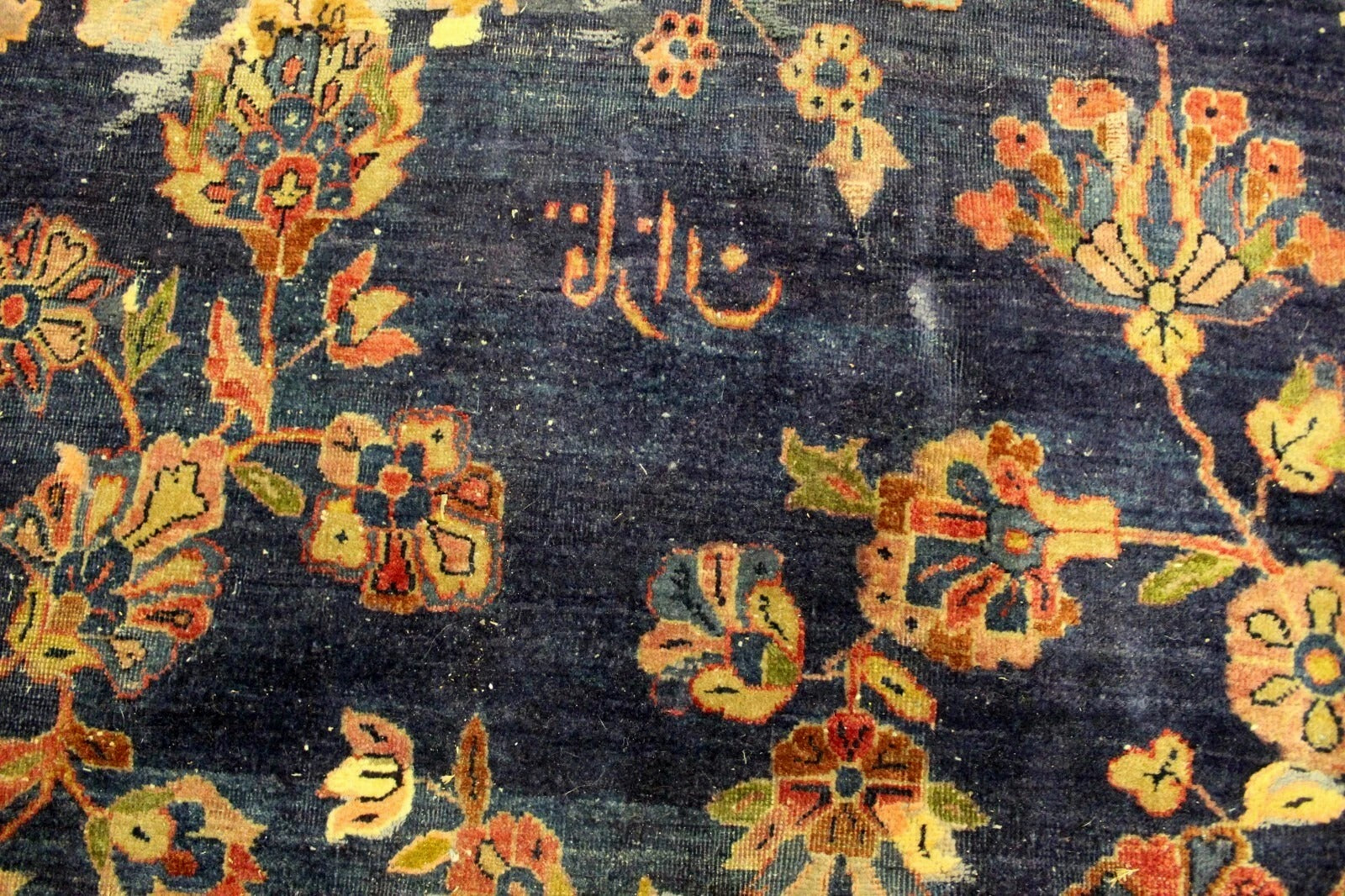 Persian artisan rug with century-old craftsmanship and historical charm

