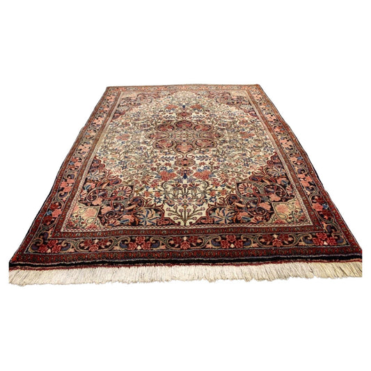 Close-up of intricate floral motifs on a Persian Bidjar rug

