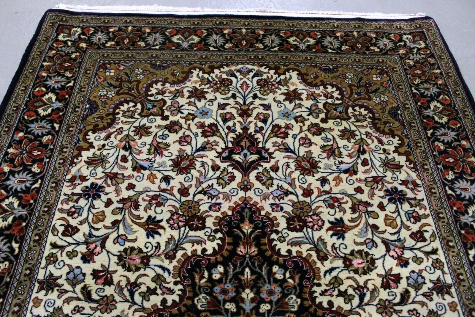 Intricate Central Medallion with Floral Motifs and Geometric Patterns on Qum Rug - 1970s