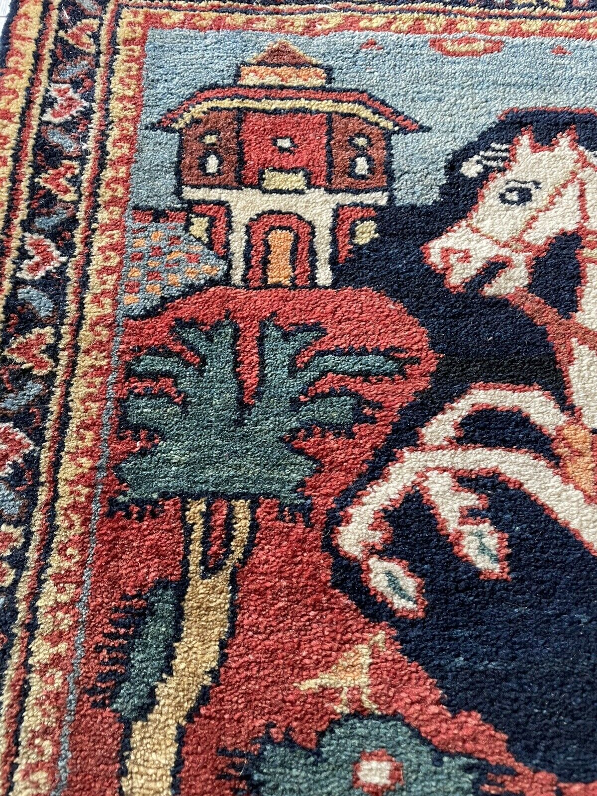 Close-up of fine artistry on Handmade Antique Persian Lilihan Collectible Rug - Detailed view showcasing the fine artistry and craftsmanship of the Persian-style rug.