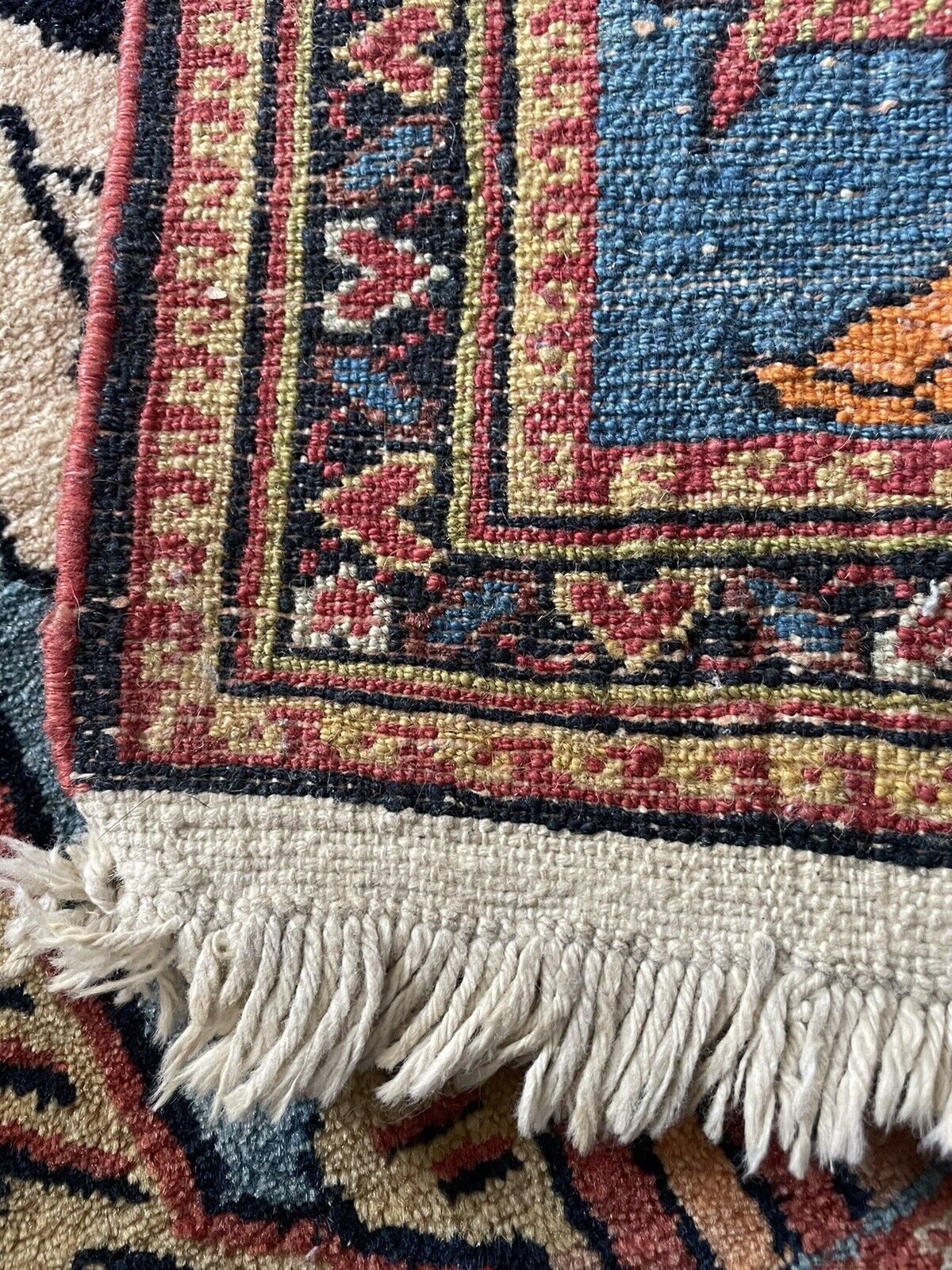 Back side of the Handmade Antique Persian Lilihan Collectible Rug - Underside view revealing the rug's construction and material.