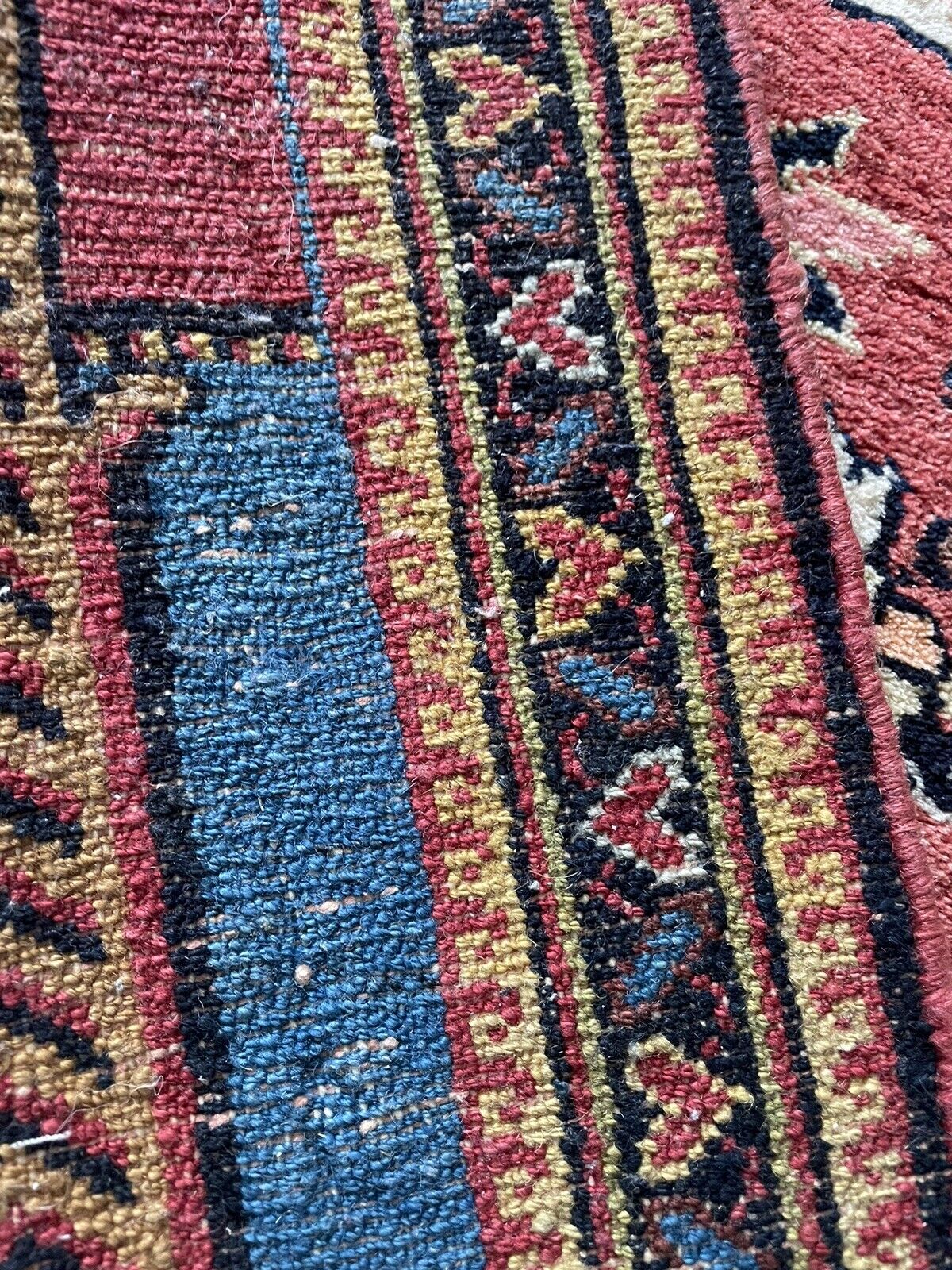 Back side of the Handmade Antique Persian Lilihan Collectible Rug - Underside view revealing the rug's construction and material.