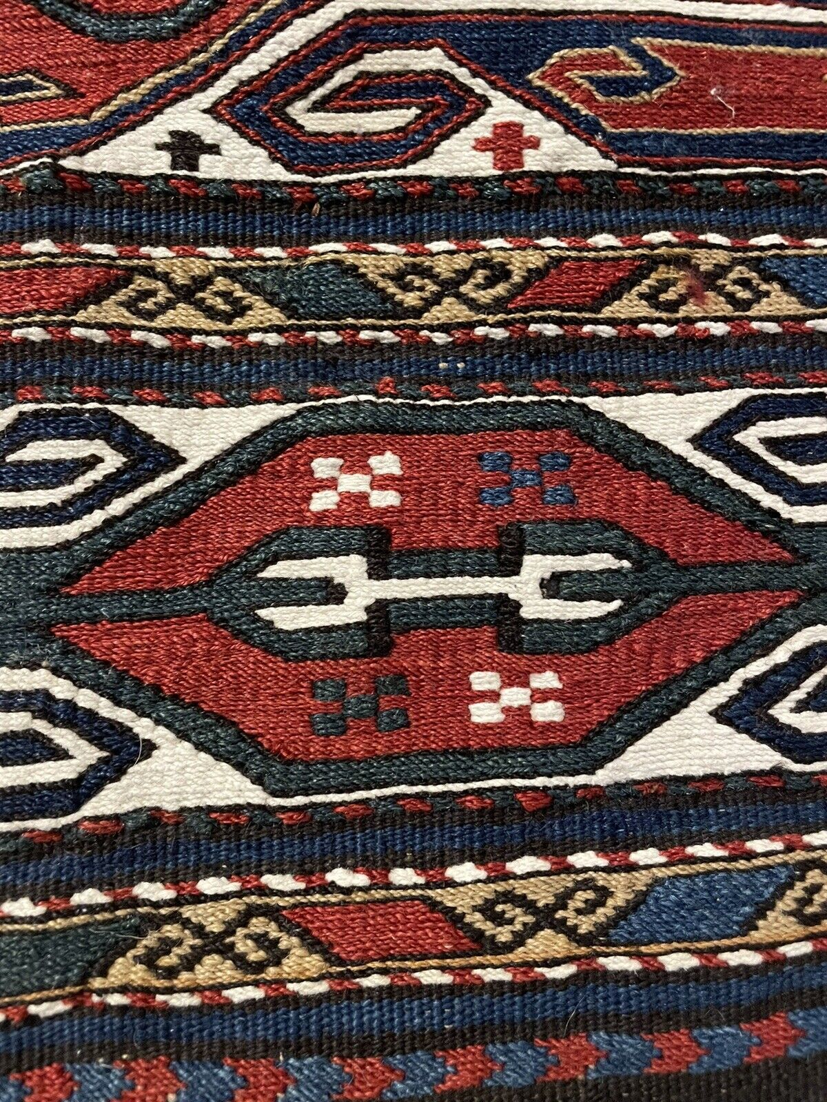 Close-up of historical significance on Handmade Antique Persian Sumak Collectible Kilim - Detailed view emphasizing the historical significance of the kilim dating back to the 1900s.