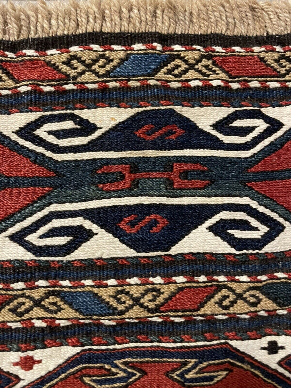 Close-up of durability on Handmade Antique Persian Sumak Collectible Kilim - Detailed view emphasizing the durability of the kilim despite its age.