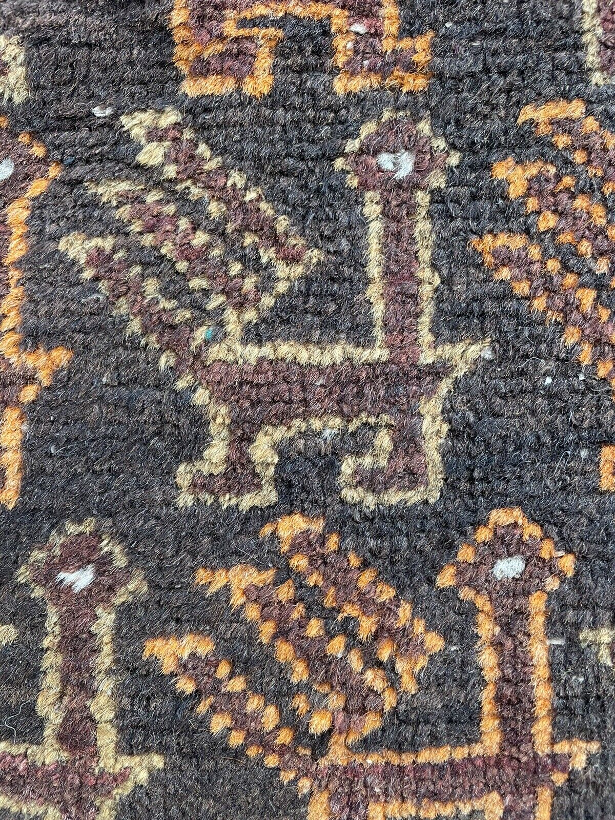 Close-up of repeating animal design on Handmade Vintage Afghan Baluch Collectible Rug - Detailed view showcasing the unique repeating animal design of the rug.
