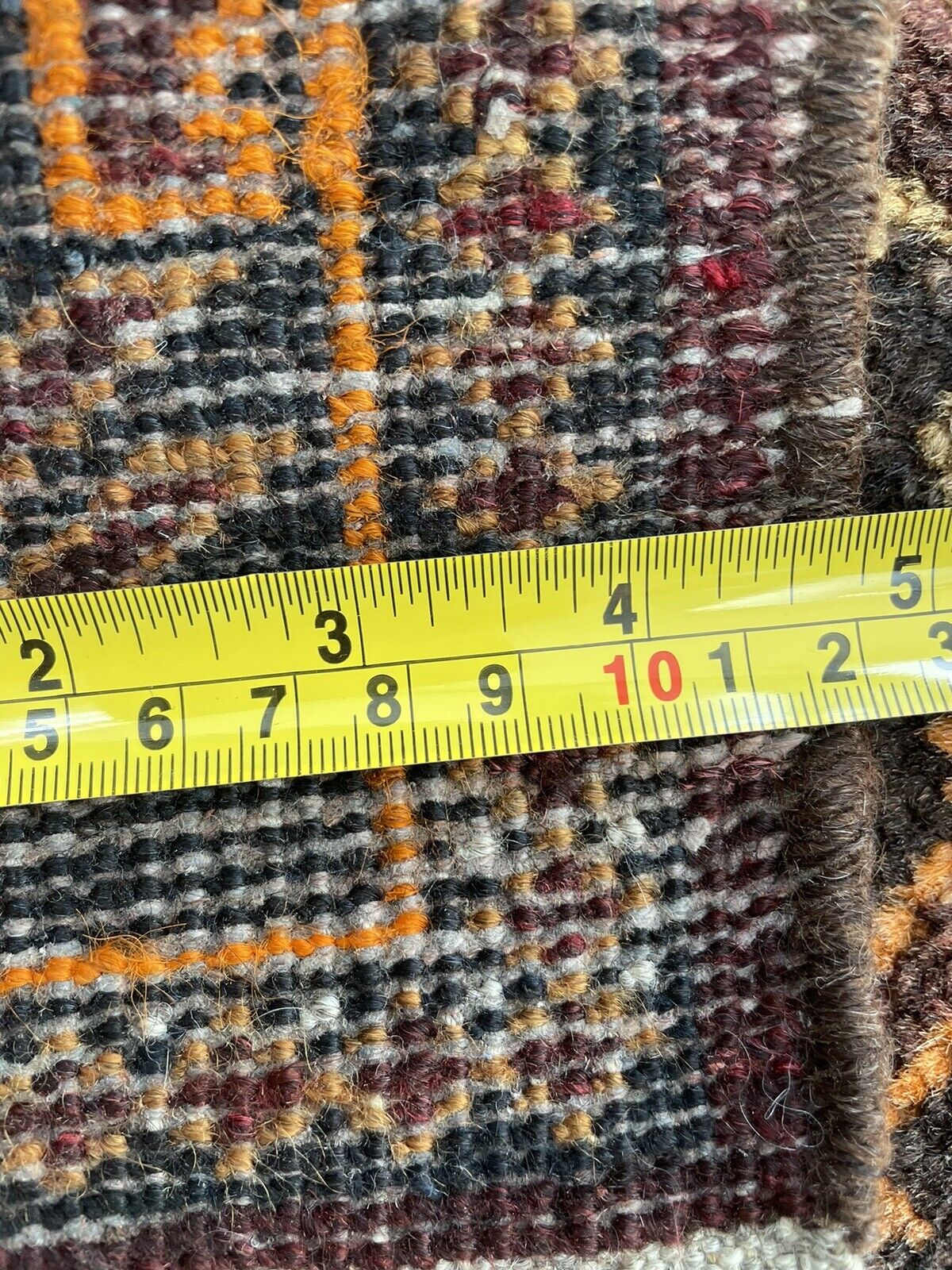 Back side of the Handmade Vintage Afghan Baluch Collectible Rug - Underside view revealing the rug's construction and material.