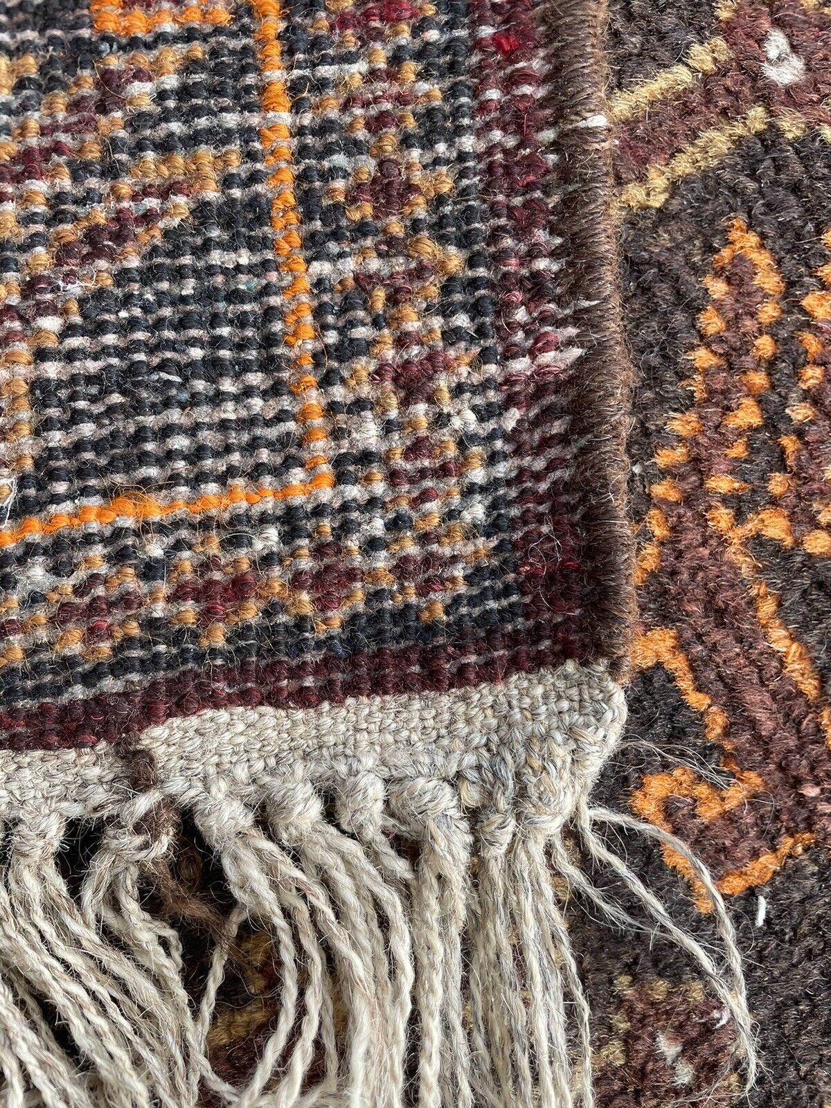 Back side of the Handmade Vintage Afghan Baluch Collectible Rug - Underside view revealing the rug's construction and material.