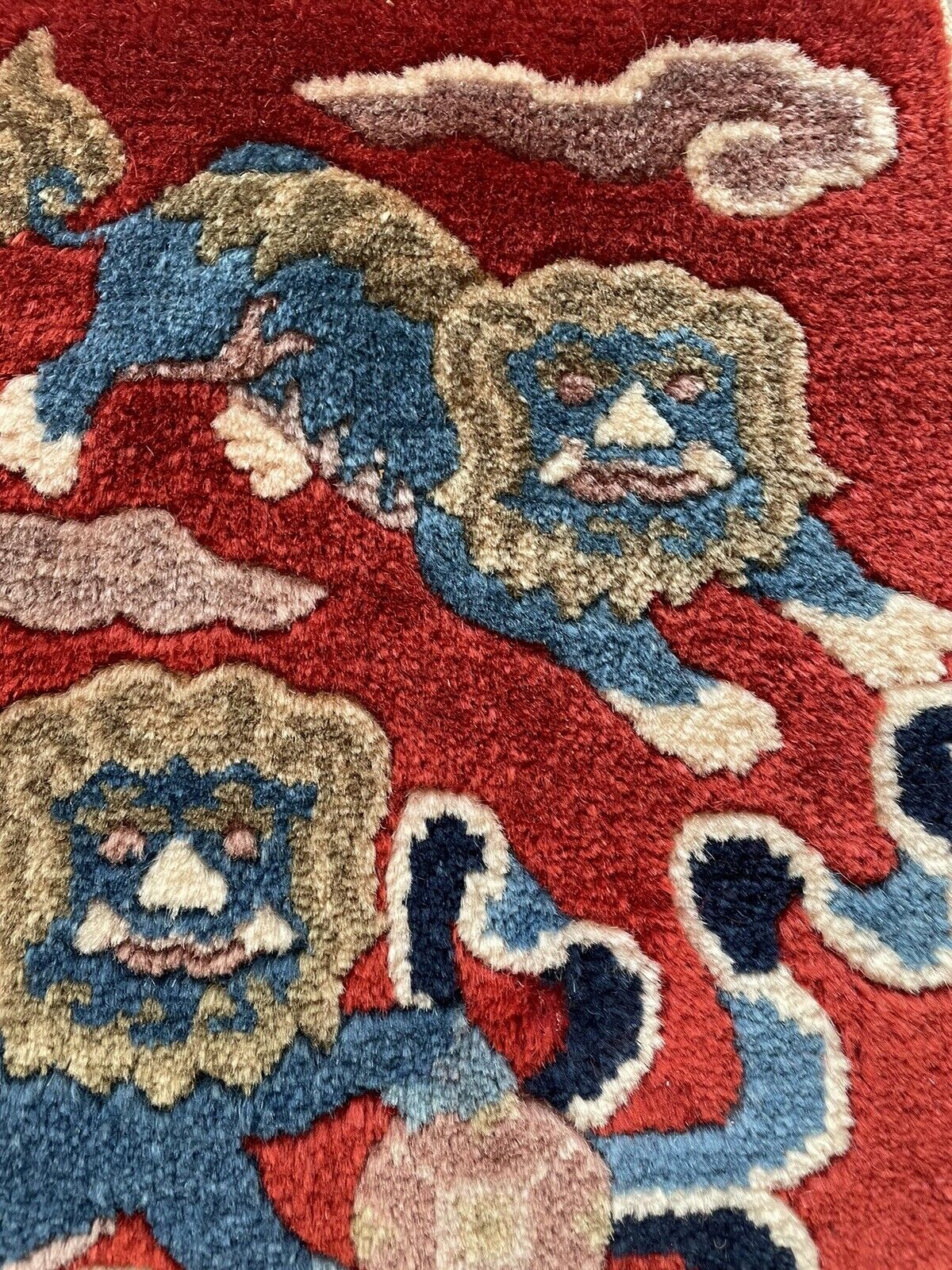 Close-up of craftsmanship on Handmade Antique Art Deco Chinese Mat - Detailed view highlighting the meticulous craftsmanship involved in weaving the intricate lions design.