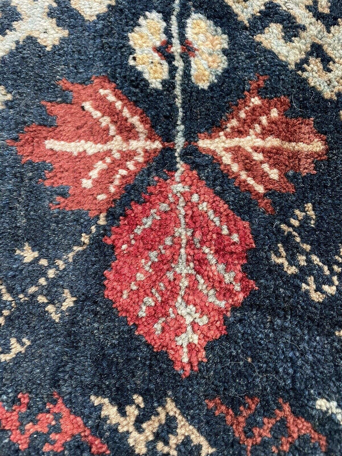 Close-up of craftsmanship on Handmade Vintage Persian Hamadan Salt Bag - Detailed view highlighting the meticulous craftsmanship involved in creating the salt bag's intricate designs.