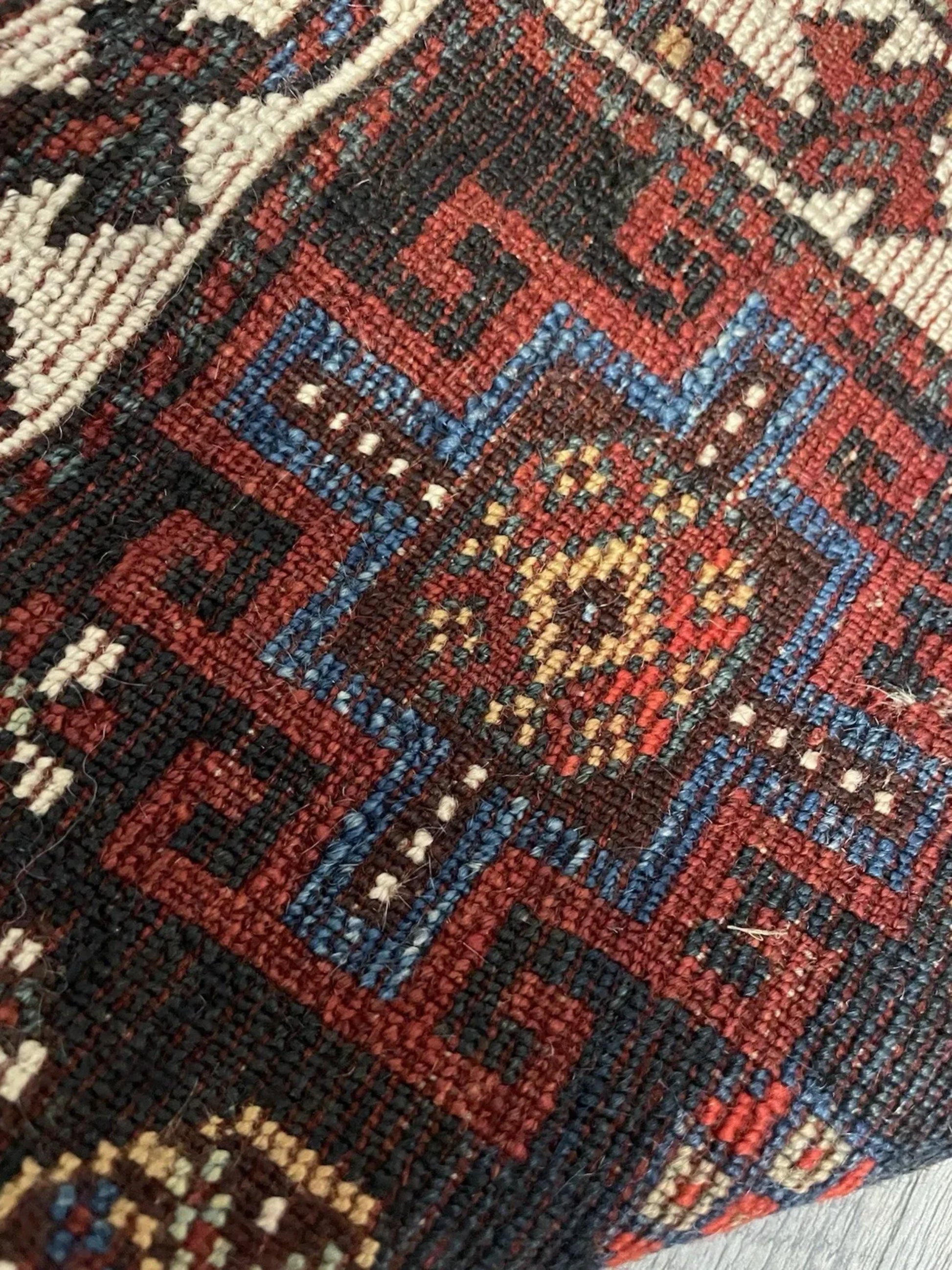 Hand-spun wool texture and knotting details

