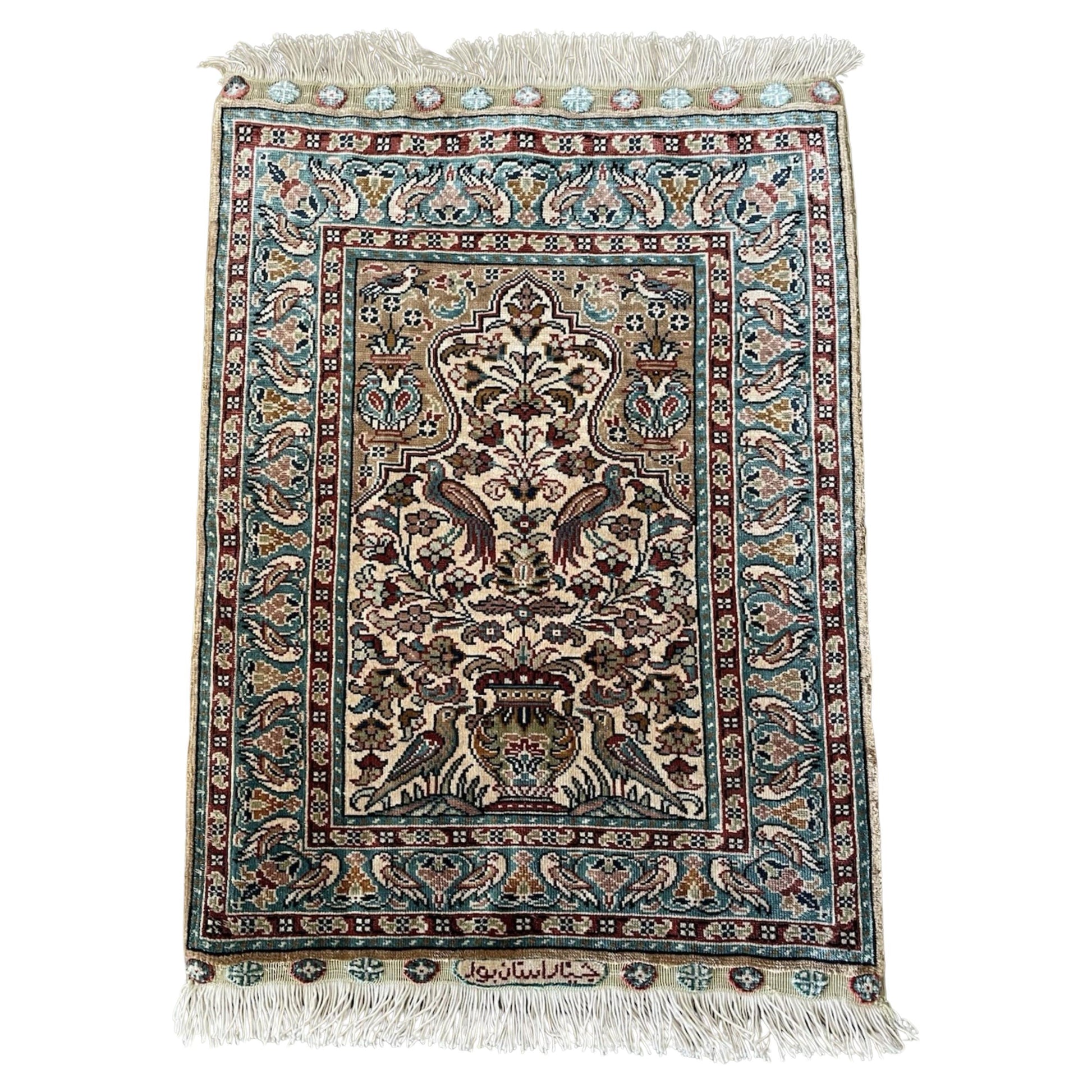 Vintage Turkish Hereke silk miniature rug

