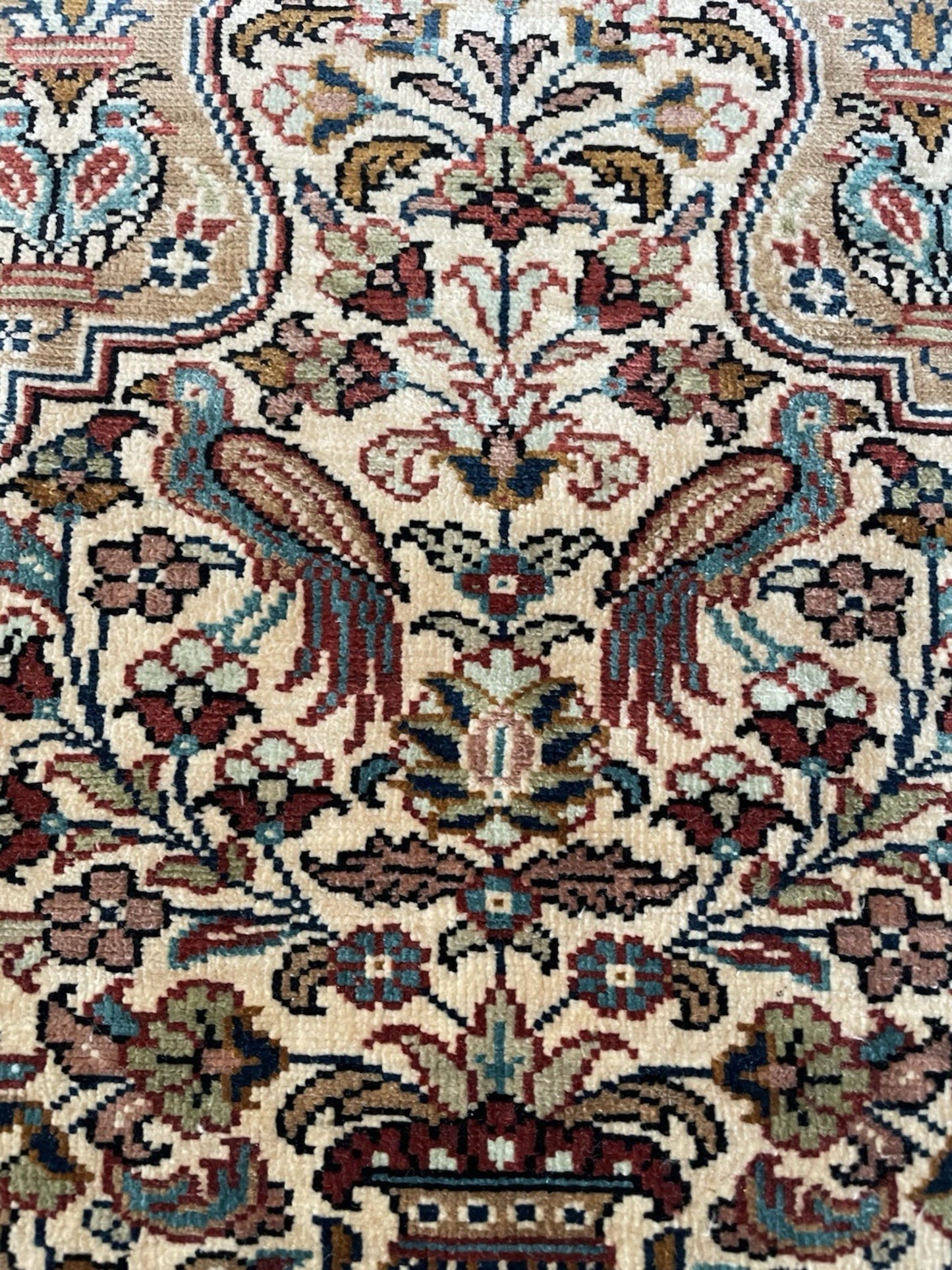 Color harmony between ivory field and colored motifs

