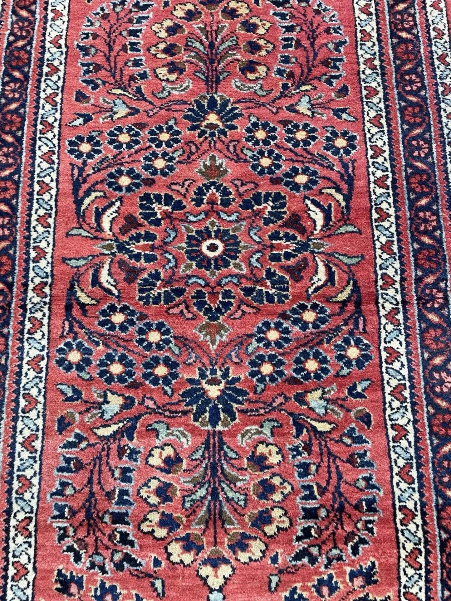 Full rug view showing balanced floral composition

