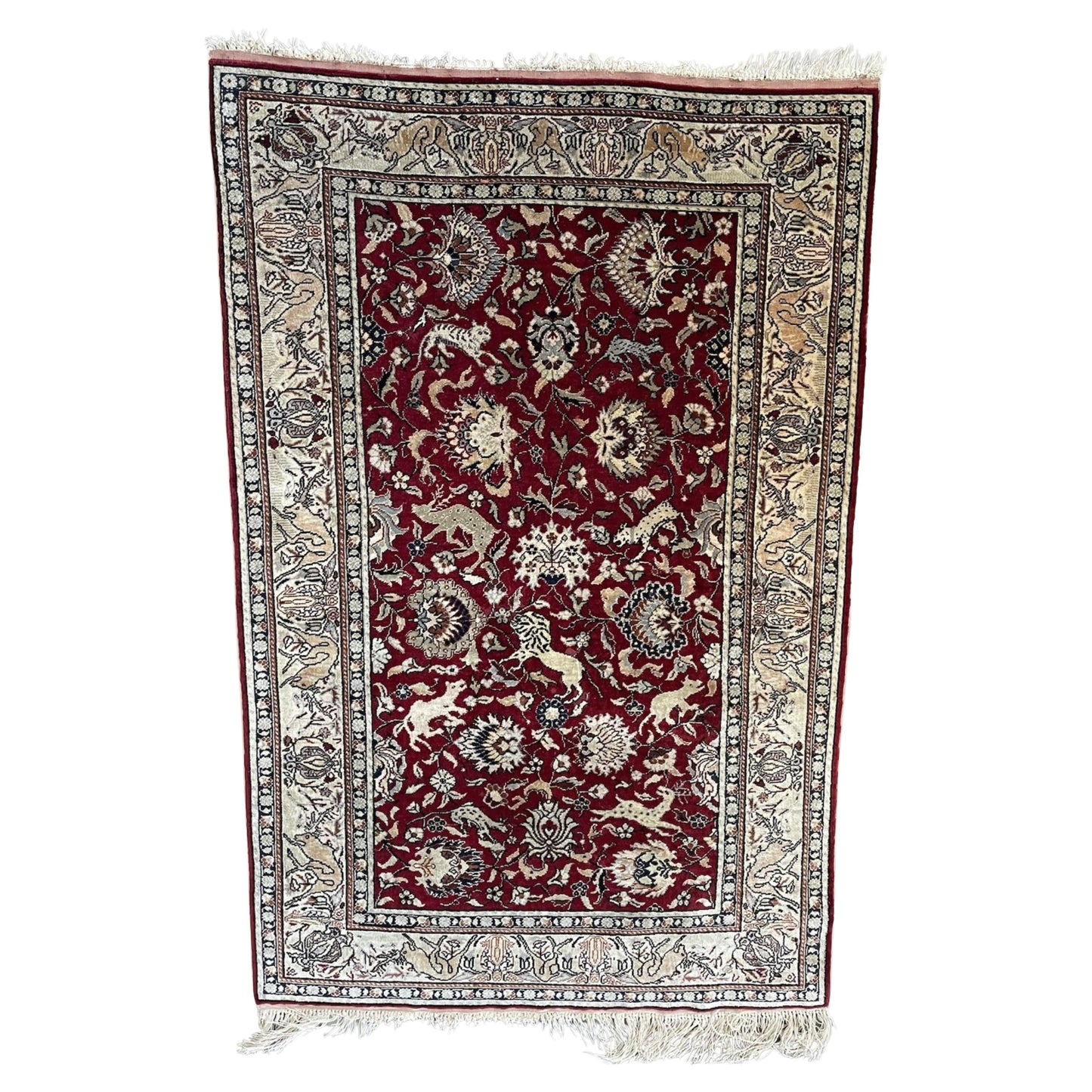 Vintage Turkish Hereke silk rug with Ottoman floral motifs

