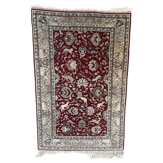 Vintage Turkish Hereke silk rug with Ottoman floral motifs

