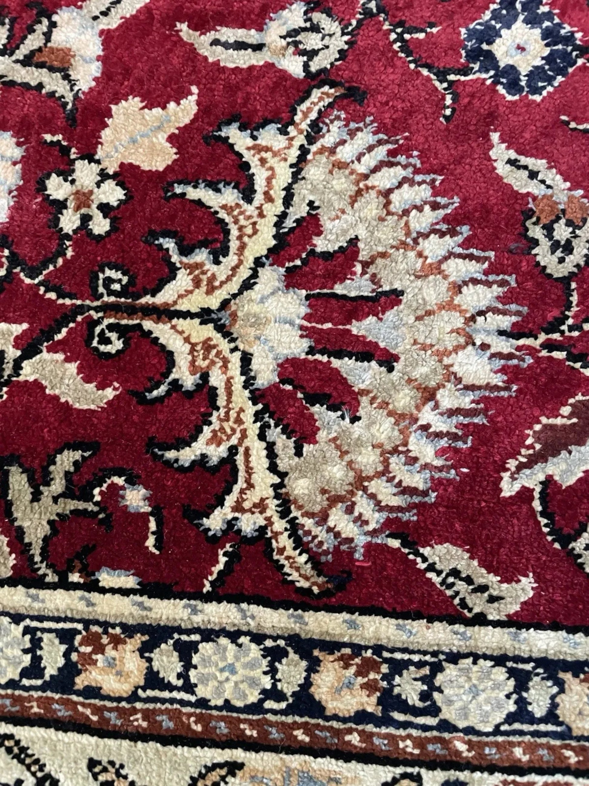 Full rug view showing balanced floral composition

