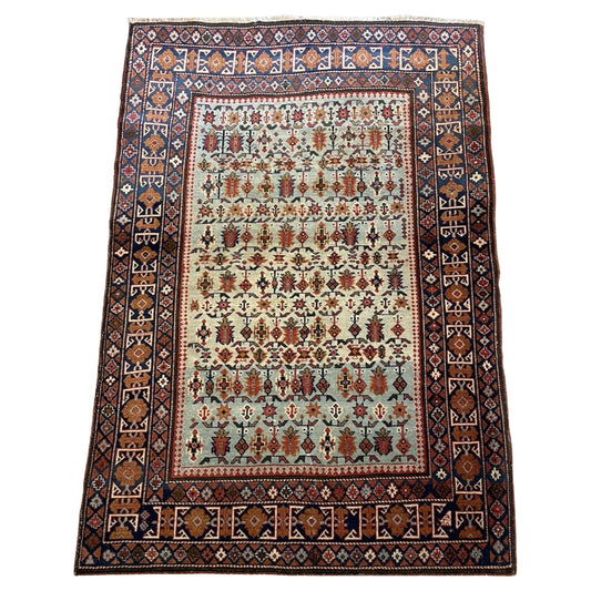 Vintage Caucasian Darband rug with geometric motifs

