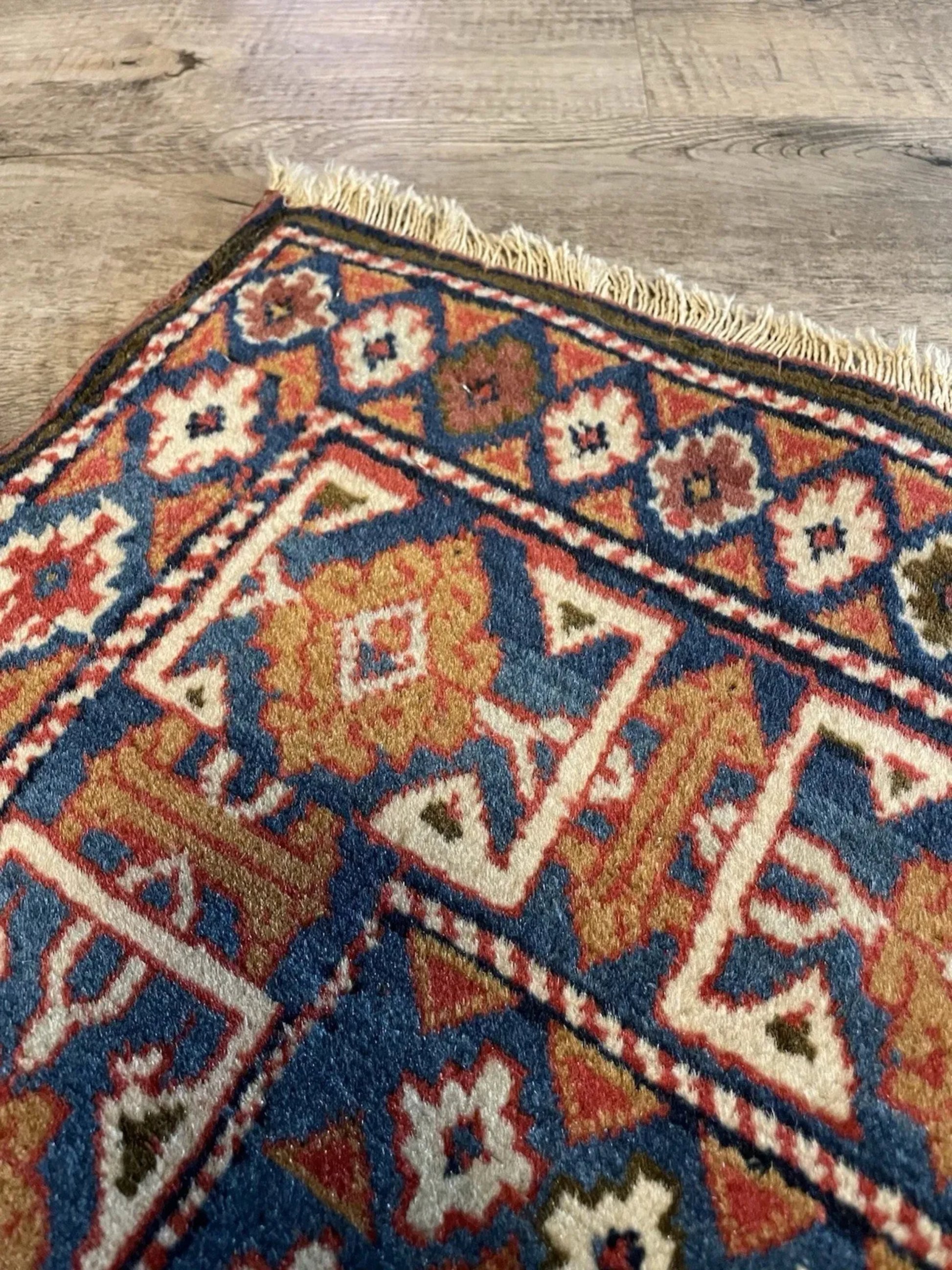 Earthy red and ivory elements in tribal design

